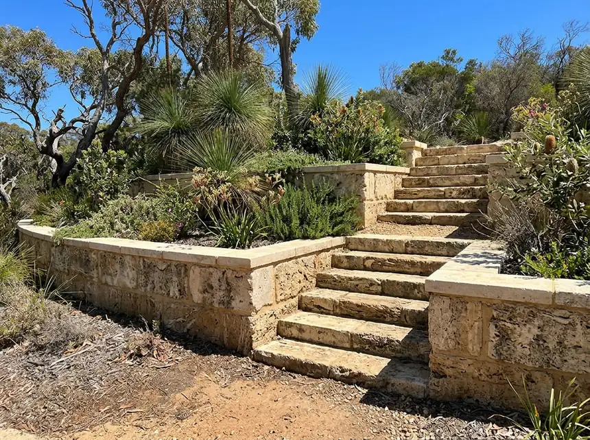 Retaining walls Mandurah — terraced limestone block retaining wall with steps